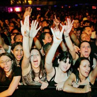 Fans react as Papa Roach performs at The Joint inside the Hard Rock Hotel & Casino August 5, 2005 in Las Vegas, Nevada. The rock group is touring in...