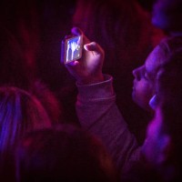 Fans take photographs with mobile phones as the The Vamps performs onstage for War Child during BRITs Week 2018 at Dingwalls on February 22, 2018 in...
