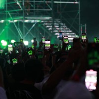 Fans take video with their smartphone during the FerxxoCalipsis Tour at Estadio Civitas Metropolitano on July 27, 2024 in Madrid, Spain.