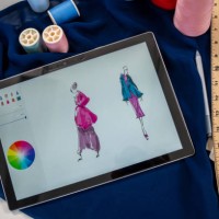fashion designer draws a sketch of women's clothing. - fashion stock pictures, royalty-free photos & images