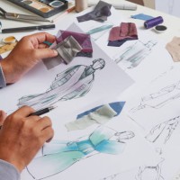 fashion designer sketching costume design - fashion stock pictures, royalty-free photos & images