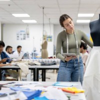 fashion designer student designing a skirt - fashion stock pictures, royalty-free photos & images