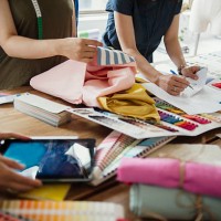 fashion designers working in studio - fashion stock pictures, royalty-free photos & images