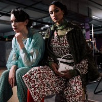 fashion portrait of two women indoors together, lifestyle photography. person of color and white girl, diversity concept photo. - fashion stock pictures, royalty-free photos & images