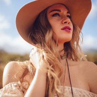 fashion shot of a boho girl wearing a felt hat - fashion stock pictures, royalty-free photos & images