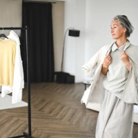 fashion stylist choosing capsule clothes - fashion stock pictures, royalty-free photos & images