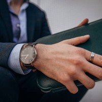 fashionable gentleman with man purse - fashion stock pictures, royalty-free photos & images