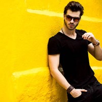 fashionable handsome man isolated on yellow wall - fashion stock pictures, royalty-free photos & images
