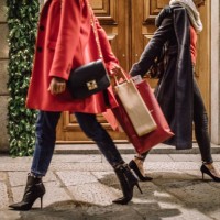 fashionable ladies in christmas shopping - fashion stock pictures, royalty-free photos & images