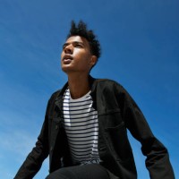 fashionable man looking away against blue sky - fashion stock pictures, royalty-free photos & images