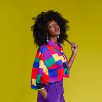 fashionable woman in colorful shirt - fashion stock pictures, royalty-free photos & images