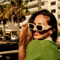 fashionable woman in green dress living her dreams - fashion stock pictures, royalty-free photos & images