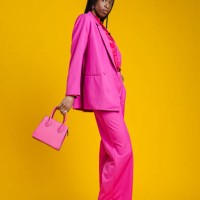fashionable woman in pink suit - fashion stock pictures, royalty-free photos & images