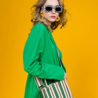 fashionable woman wearing green blazer - fashion stock pictures, royalty-free photos & images