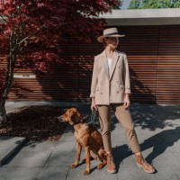 fashionable woman with her dog in the city - fashion stock pictures, royalty-free photos & images
