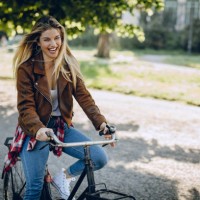 fashionable woman with vintage bike - fashion stock pictures, royalty-free photos & images