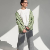 fashionable young woman posing in a new collection of clothes on a white cyclorama background in the studio. fashion concept - fashion stock pictures, royalty-free photos & images