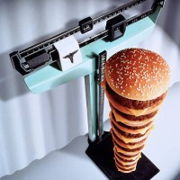 fast food / calories stacking up - junk food stock pictures, royalty-free photos & images