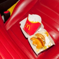 Fast food in the interior of the Mustang owned by fanatic Frederic Henin. Thousands of ordinary people across Europe share extraordinary connections...