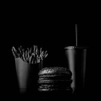 fast food meal on black backdrop - junk food stock pictures, royalty-free photos & images