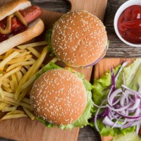 fast food on the wood - junk food stock pictures, royalty-free photos & images