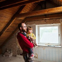father and daughter examining attic under construction - home decoration fotografías e imágenes de stock