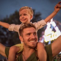 father and son on festival - concert stock pictures, royalty-free photos & images