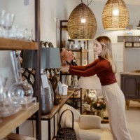 female choosing home accessories - home decoration stock pictures, royalty-free photos & images