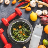 female dumbbells, vegetables, fruit and sport's bottle - food stock pictures, royalty-free photos & images