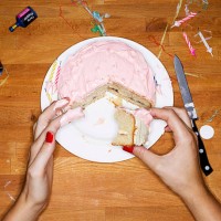 female eating cake - junk food stock pictures, royalty-free photos & images