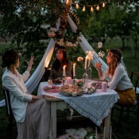 female friends celebrating easter egg hunt outdoors - garden decoration stock pictures, royalty-free photos & images