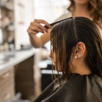 female hairdresser, cutting her female client hair, at hair salon - hairstyle stock pictures, royalty-free photos & images