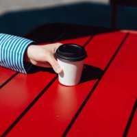 female hand holding recycable takeaway coffee cup - junk food stock pictures, royalty-free photos & images