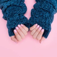 female hands manicure close up view on pink knitted sweater background. nail painting effects. manicure salon banner concept - nails art stock pictures, royalty-free photos & images