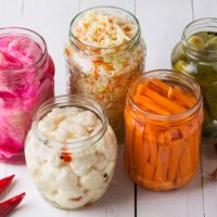 fermented vegetables. sauerkraut with carrots and cucumbers. - food stock pictures, royalty-free photos & images