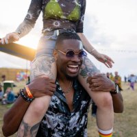 festival shoulder carry - concert stock pictures, royalty-free photos & images