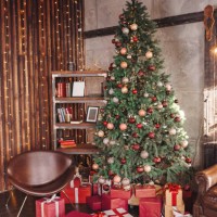 festive room with decorated christmas tree surrounded by gifts - home decoration stock pictures, royalty-free photos & images