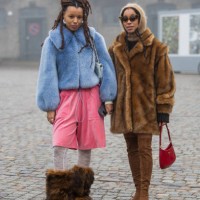 Fia Hamelijnck wears blue jacket, pink pants, fur boots & Amaka Hamelijnck wears brown fur coat, balaclava, red Prada bag, over knee wild leather...
