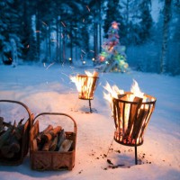 fires in pits in snowy field - garden decoration stock pictures, royalty-free photos & images