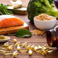 fish oil capsules and diet rich in omega-3 - food stock pictures, royalty-free photos & images