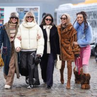 Five guests are posing, outside Rolf Ekroth, during the Copenhagen Fashion Week AW24 on January 30, 2024 in Copenhagen, Denmark.