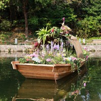 flowers on boat - garden decoration stock pictures, royalty-free photos & images