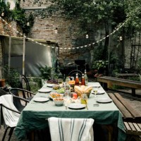 food and drink arranged on dining table in empty back yard - garden decoration stock pictures, royalty-free photos & images