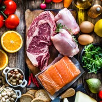 food backgrounds: table filled with large variety of food - food stock pictures, royalty-free photos & images