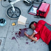 food delivery man bike accident. - junk food stock pictures, royalty-free photos & images