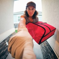 food delivery person - junk food stock pictures, royalty-free photos & images