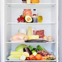 food forming a food pyramid in a fridge - food stockfoto's en -beelden