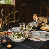 food in bowl by plate and drinking glass arranged on dining table during social gathering - home decoration stock pictures, royalty-free photos & images