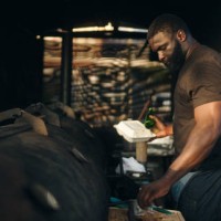 food truck owner holding takeout container and bottle - junk food stock pictures, royalty-free photos & images