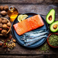food with high content of healthy fats on rustic table. overhead view. - food stock pictures, royalty-free photos & images